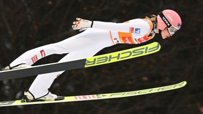 Ski jumper Marita Kramer in the air after launch