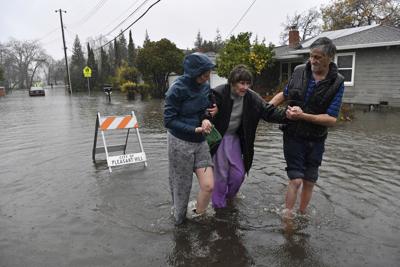 Epic flooding leads to water rescues and highway closures in California as the storm system threatens more states