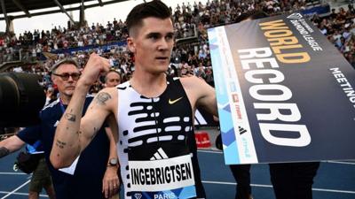 Norway's Jakob Ingebrigtsen celebrates after breaking the World record in the men's 2 miles event during the IAAF Diamond League "Meeting de Paris" athletics meeting at the Charlety Stadium in Paris on June 9, 2023. (Photo by Jeff PACHOUD / AFP) (Photo ...