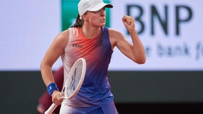 PARIS, FRANCE - MAY 29: Iga Swiatek of Poland celebrates a point against Naomi Osaka of Japan in the Women's Singles second round match on Day Four of the 2024 French Open at Roland Garros on May 29, 2024 in Paris, France. (Photo by Mateo Villalba/Getty...