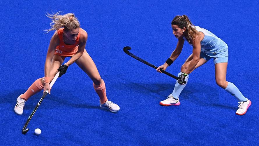 Netherlands' Laura Maria Nunnink is challenged by Argentina's Agostina Alonso during the women's gold medal match of the Tokyo 2020 Olympic Games.