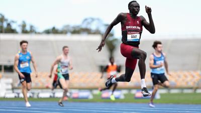 BRISBANE, AUSTRALIA - DECEMBER 06: Gout Gout of Queensland wins his Boys' U18 100m heat in 10.04 seconds with a +3.4 tail-wind during the 2024 Chemist Warehouse Australian All Schools Athletics Championship at Queensland Sport and Athletics Centre on De...