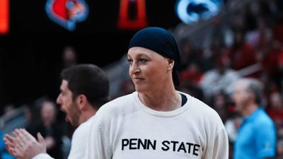 Penn State head coach Katie Schumacher-Cawley watched action against Louisville during the NCAA Championship Volleyball match at the KFC Yum! Center in Louisville, Ky. on Dec. 22, 2024.