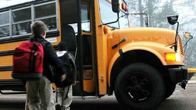 Students Getting on School Bus